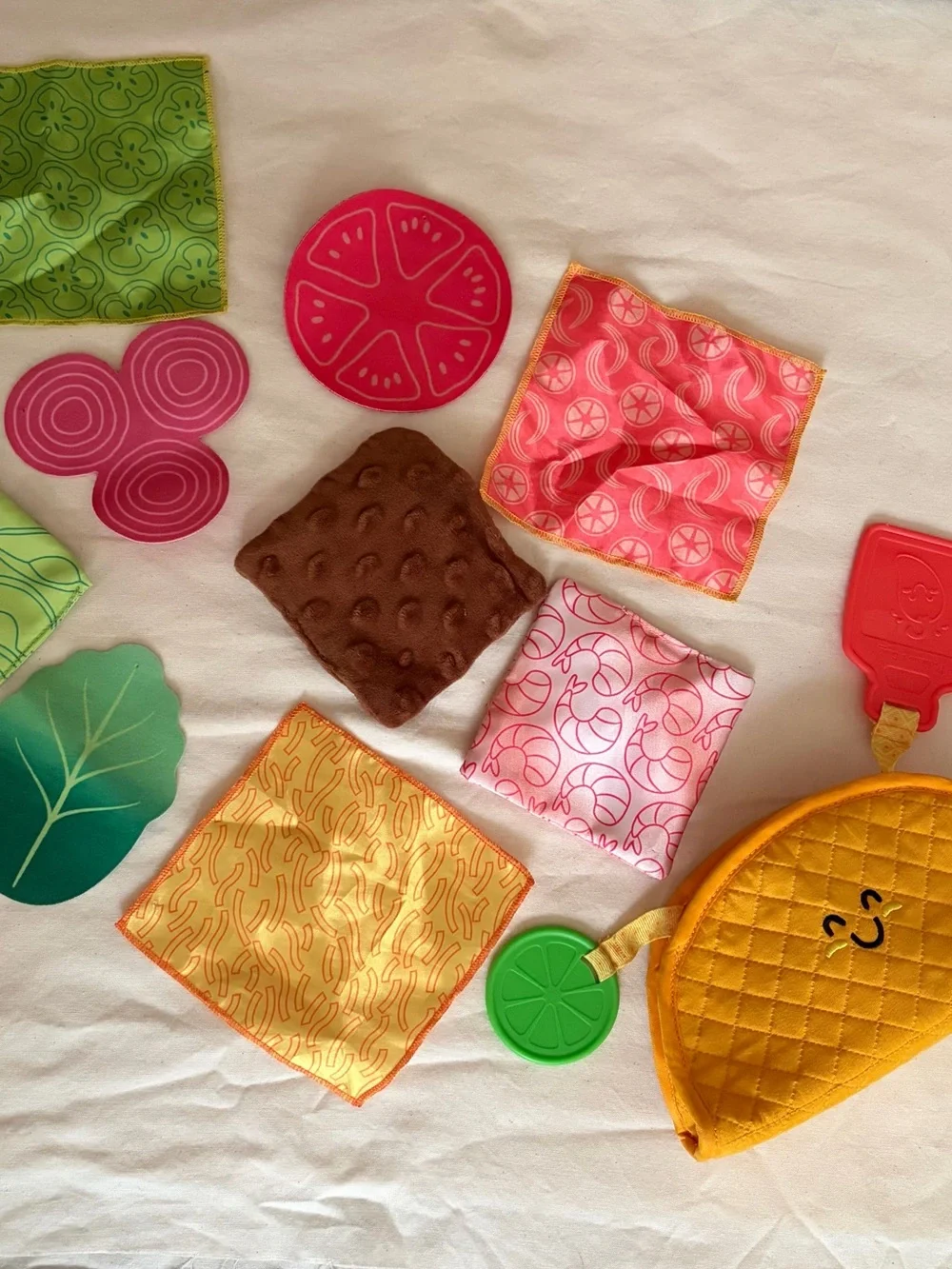 Melissa & Doug Multi-Sensory Soft Taco Fill and Spill Baby toy